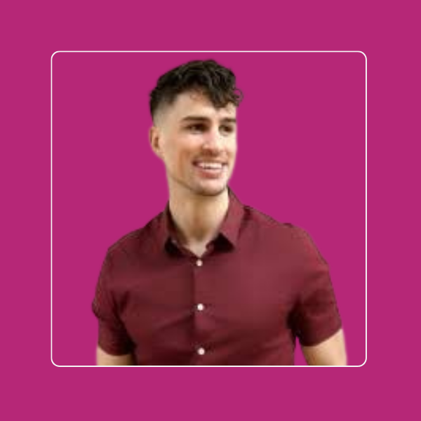 Michael, career transition coaching client, smiling headshot on a magenta background