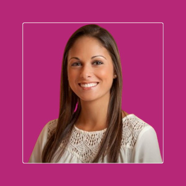 Stephanie, career clarity for career fulfillment client, smiling headshot on a magenta background